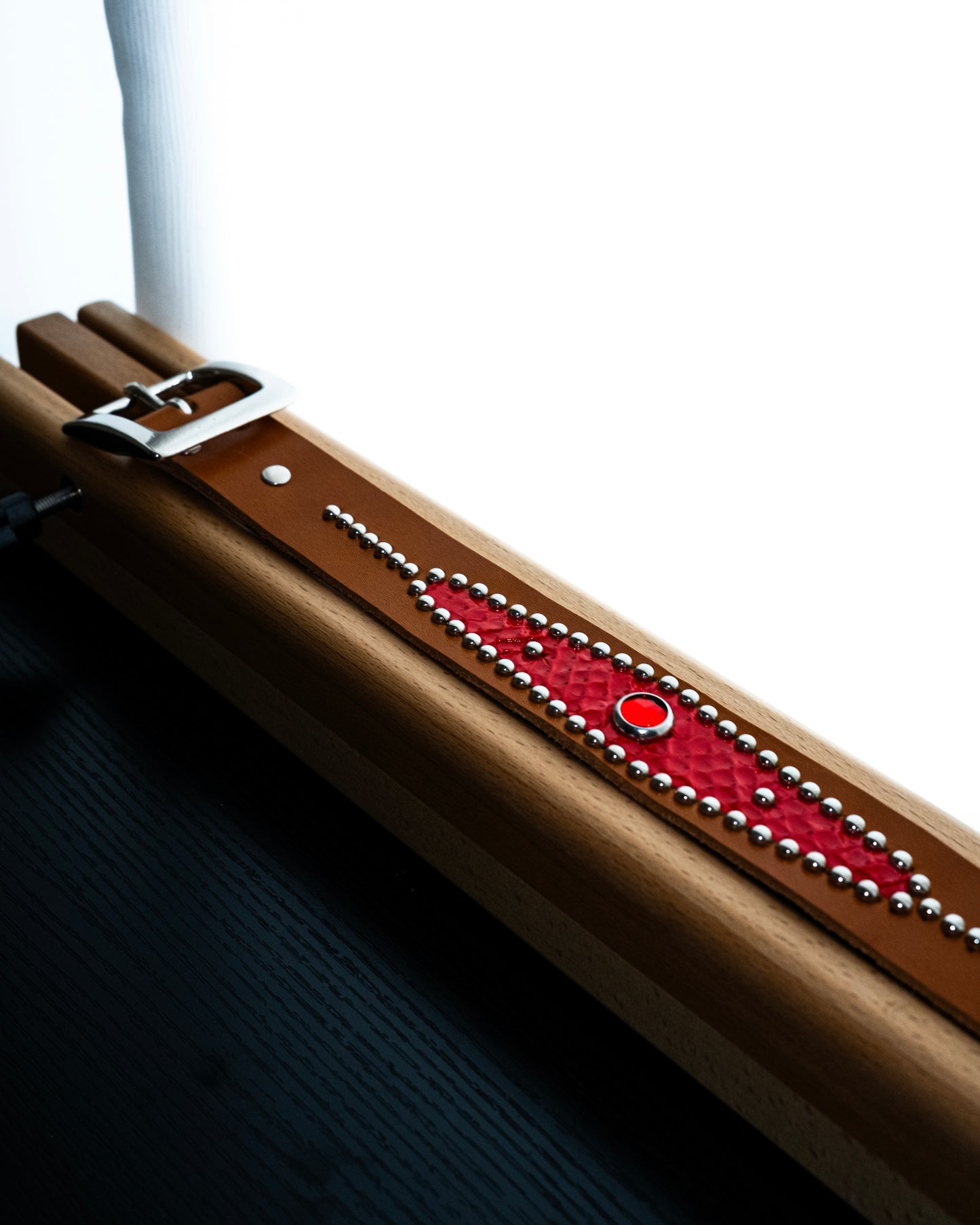 STUDDED RED SNAKESKIN BELT IN ORANGE 01