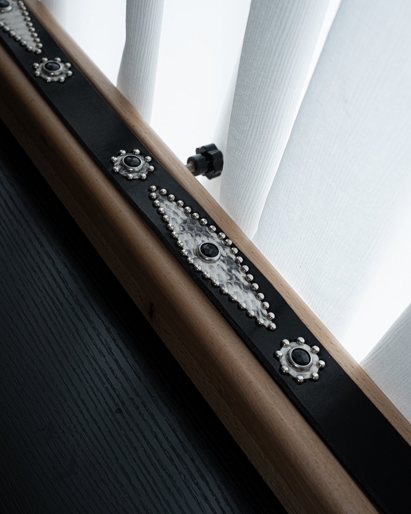STUDDED WHITE SNAKESKIN BELT IN BLACK 02